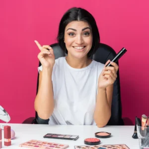 Woman pointing up giving dermatologist advice on safe makeup removal tips