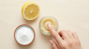 DIY nail whitening scrub ingredients with fresh lemon and baking soda